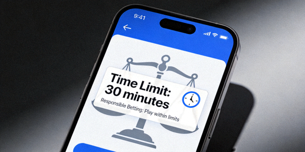 스마트폰 화면에 시간 제한 알림이 표시되어 책임감 있는 모바일 베팅을 상징하는 이미지